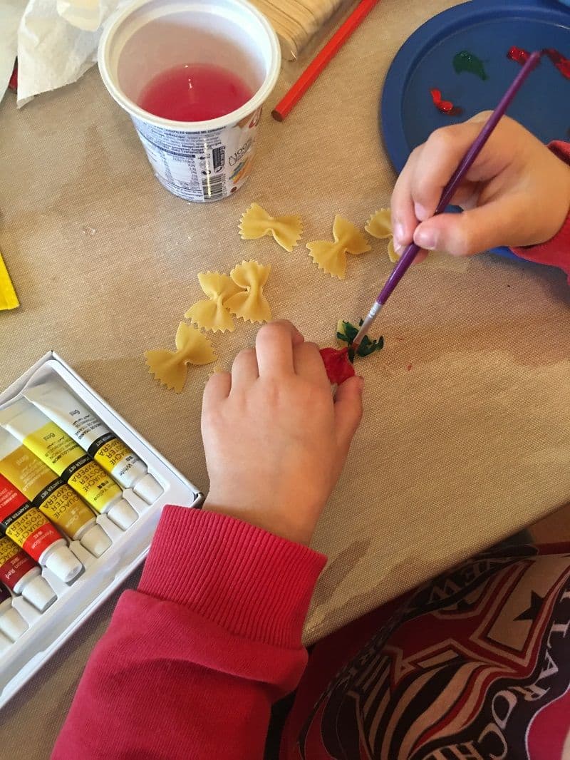 Butterflies craft for preschoolers with spaghetti bows and water colors.