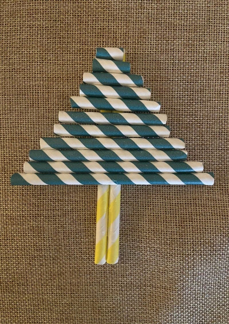 Craft for kids with straws for the holidays. Christmas and New Year's. Christmas tree.