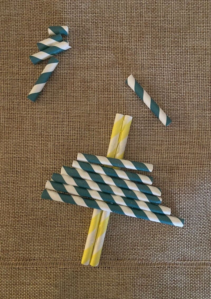 Craft for kids with straws for the holidays. Christmas and New Year's. Christmas tree.