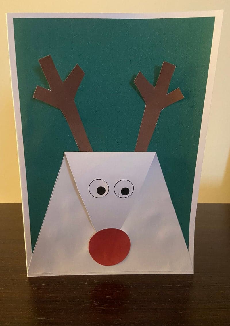 Free printable craft for kids for the holidays. Christmas and New Year's. Rudolf the red nose reindeer card.