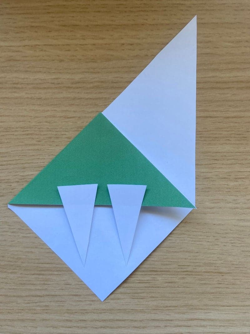 Monster bookmarks craft for preschoolers with free printable material. Building process.