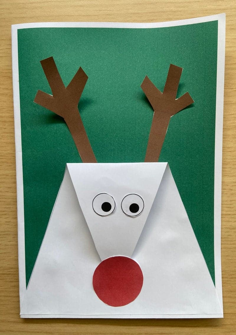 Free printable craft for kids for the holidays. Christmas and New Year's. Rudolf the red nose reindeer card.