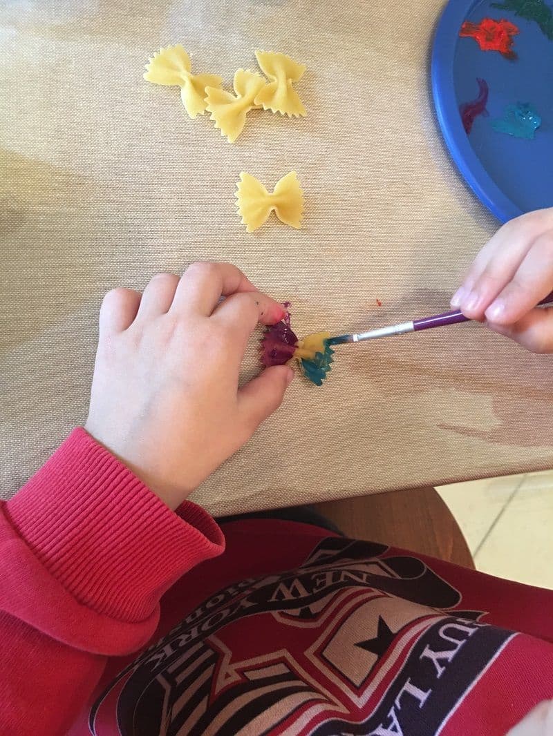 Butterflies craft for preschoolers with spaghetti bows and water colors.