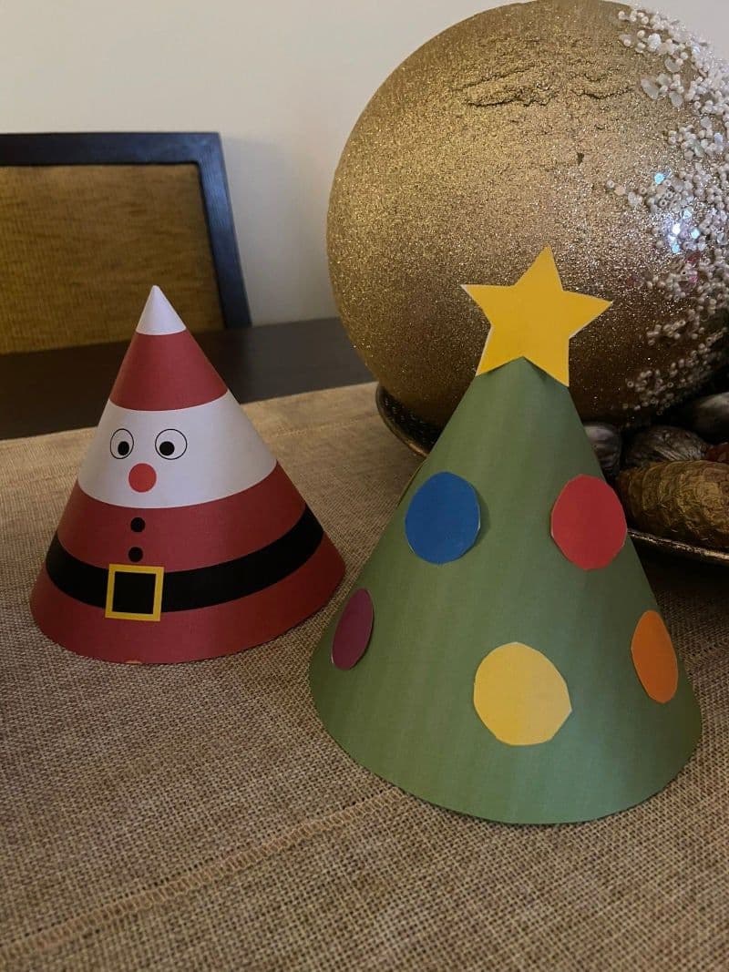 Free printable craft for kids for the holidays. Christmas and New Year's. Cone Christmas tree and Santa Claus.