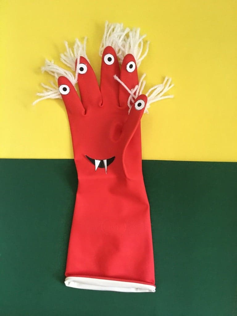 Monster glove craft for preschoolers with free printable material.